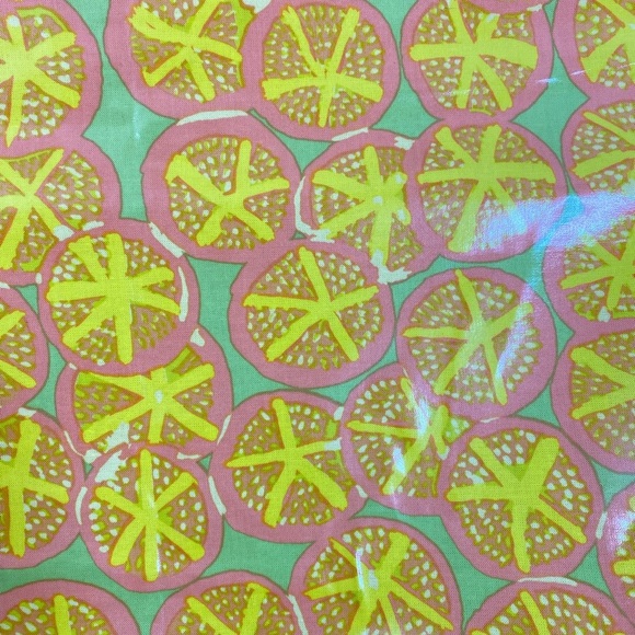 100% COTTON BASE FABRIC WITH WATERPROOFING PLASTIC OVERTOP IN A VIBRANT CITRUS - Picture 6 of 6